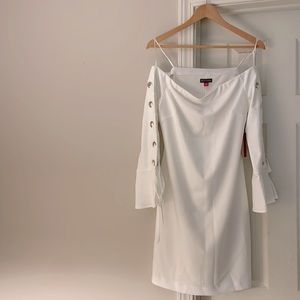 White strapless flounce laced sleeve dress. Size small.